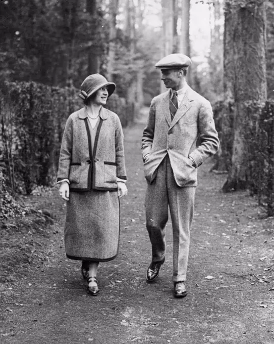 The King and Queen - then the Duke and Duchess of York - take a stroll through the grounds. They were on their honeymoon at Polsden Lacey. May 01, 1923. (Photo by Ruterphoto).