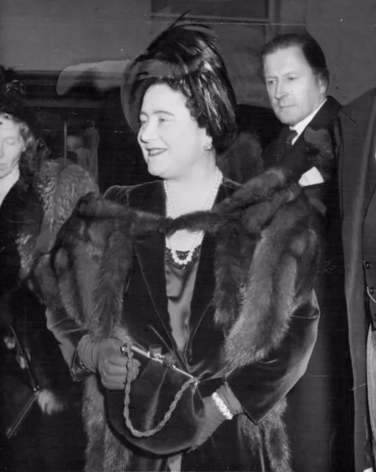 The Queen Back in London, Goes to A Lecture -- The Queen, wearing furs and a feathered hat, on arrival at the Institute Francais to-day.Just returned to London from Sandringham, the Queen went to the Institute Francais in Queensberry place, S.W. this afternoon (Tuesday) to hear a lecture in French by M. Huyghe, Director of Paintings at the Louvre, on Impressionism. February 14, 1950. (Photo by Reuterphoto).