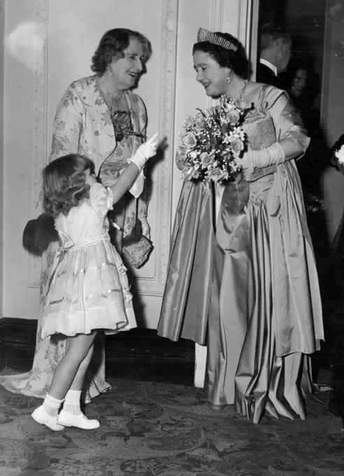 "Excuse me," said little Sarah Osborn to the Queen Mother "but what have you lot on your hair" The Queen Mother replied: "It's a tiara, my, dear." Sarah, three-year-old daughter of Sir Danvers Osborn, had just presented a bouquet to the the Mother at a performance of "Marie AntoiNette" at the Scala Theatre last night. December 03, 1953. (Photo by Daily Mirror).