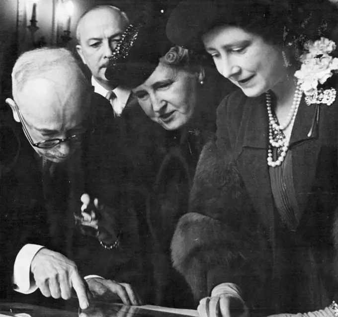 The Queen At the Czechoslovak Institute - Her Majesty the Queen, Madam Benes, Dr. Edward Benes President of the Czechoslovak Republic.Queen Elizabeth visted the Hollar exhibition at the Czechoslovak Institute, London. Her Majesty who was met by the President of Czechoslovakia and Madam Benes examined with interest the works of Wenceslas Hollar, the famous Czech engraver who is buried at St. Margaret's, Westminster.The Examination was organised by Dr. Goldschmidt. Dr. Goldschmidt is now a private in the Czechoslovak army in Great Britain, he is an outstanding authority on Hollar, Many of the exhibits have been lent by the King from tjhe Royal Collection at Windsor Castle. April 23, 1942. 