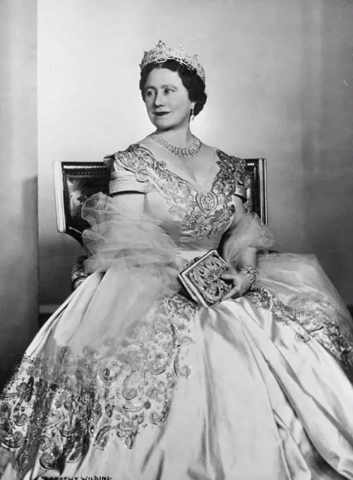 H.M. Queen Elizabeth The Queen Mother -- This new portrait study shows Her Majesty wearing a picture frock of deep oyster satin embroidered in gold and silver, with crystal beads; her jewellery and tiara are of diamonds. - The Queen Mother is on a visit to the United States and Canada; she arrives in New York on October 26th, and will visit Washington before travelling to Ottawa. She will leave New York on November 18th to return to England. October 22, 1954. (Photo by Dorothy Wilding, Camera Press)