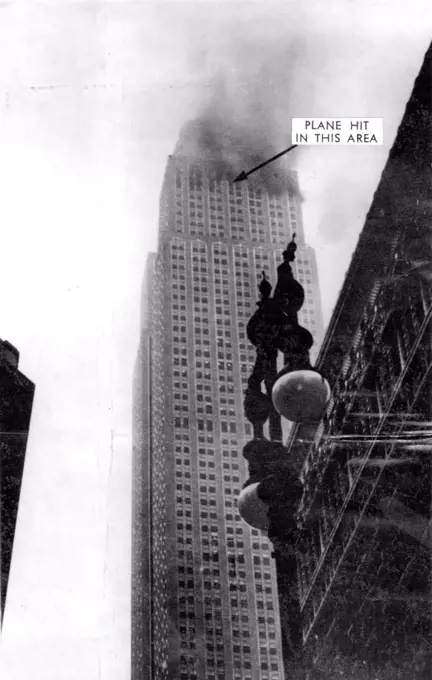 ***** From Empire State Building -- ***** from the Empire State Building in New York, July 28th, after a plane headed for Newark Airport crashed into the upper stories of the structure. Fires were started on upper eleven floors of the building. July 28, 1945. (Photo by Associated Press Photo).