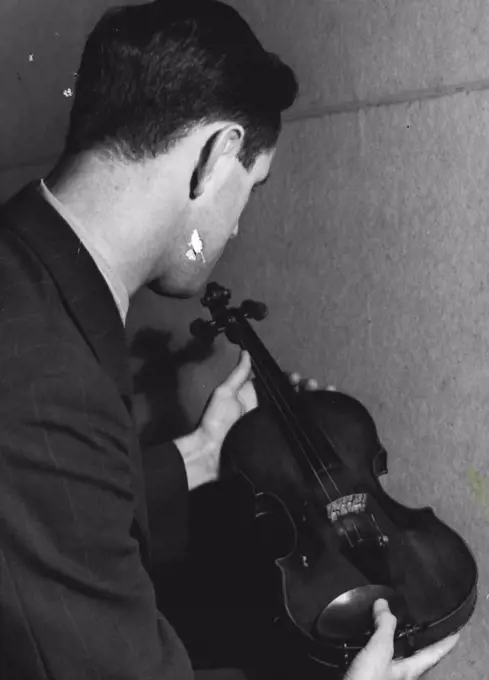 Mr. Miller with his Violin. March 11, 1940.