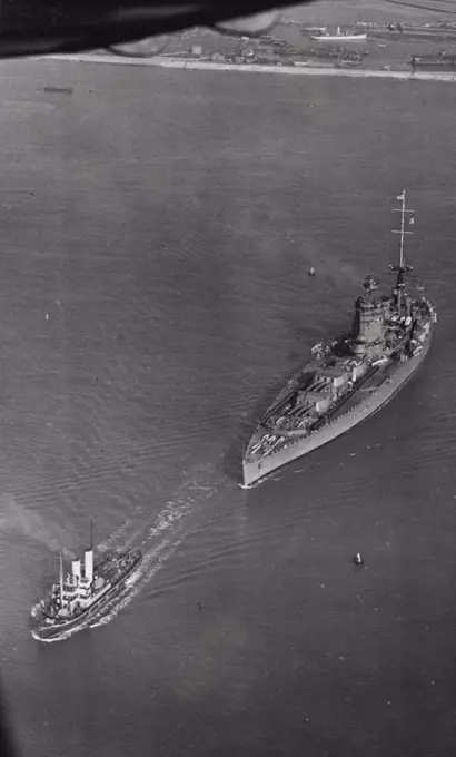 Off For Home Fleet Cruise -- An aerial view of H.M.S. Nelson first Battleship of the Home Fleet leaving Portsmouth for Portland for the Home Fleet's Spring Cruise. May 22, 1939. (Photo by London News Agency Photos Ltd.).