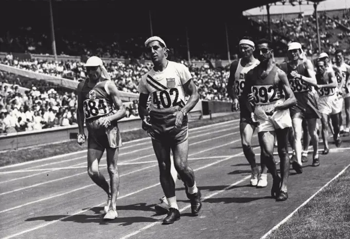 Olympic Game 1948 - Athletics - 31 miles to go - the start of the 50-kilo road walk. Twenty-one competitors set out from Wembley Stadium. It was won by the Swede, Ljunggren. July 31, 1948.