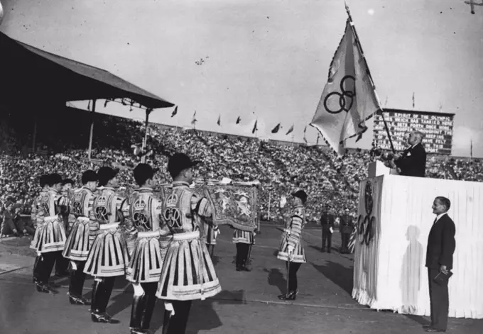Olympic Games: Closing Ceremony At Wembley - The closing scene at Wembley. The Lord Mayor of London is seen holding the Olympic Flag after he had received it to hold in safe keeping until the next Olympic Games in Helsinki. August 14, 1948. (Photo by Sport & General Press Agency, Limited).