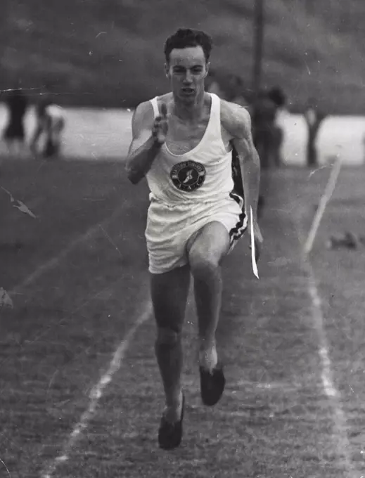 Olympic Hope -- Eastern Suburbs sprinter, Maurice Curotta, in a final training dash before leaving for the Australian title meeting in Melbourne last night. Curotta has run 48sec. for 440 yards - fastest yet by an Australian. January 20, 1948.