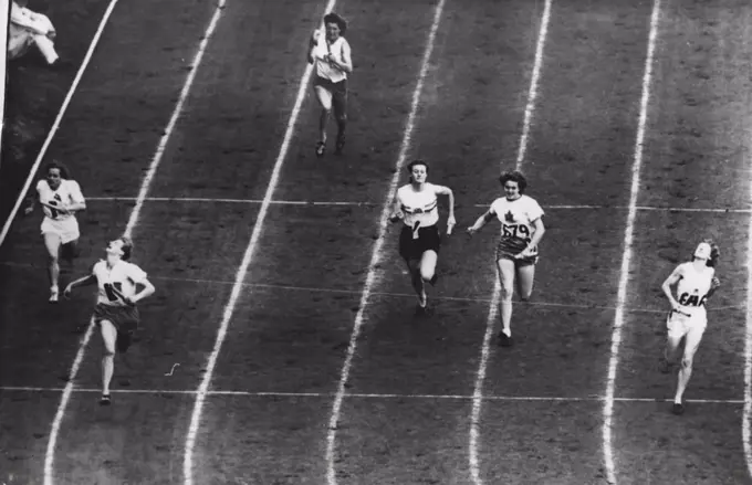 Olympic Games : The finish of the final of the 400 metres Women's relay which was won by Holland (team K) from Australia (Team A) and Canada (Team D), Great Britain (Team J), Denmark (Team F) and Austria (Team B), ***** Wembley today. August 07, 1948. (Photo by Olympic Photo Association).