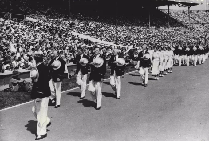 XIV Olympiad Opens: Australian Athletes pictured in the parade of six thousand athletes at Wembley Stadium, London, to-day (July 29th) as they march in procession at the opening of the 1948 Olympic Games. July 29, 1948. (Photo by Reuterphoto).