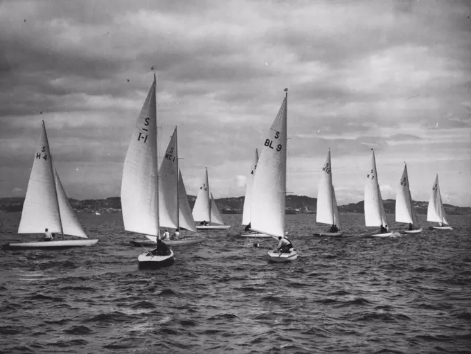 Britain's First Success In Olympic Yachting : Swallow Class Yachts jockeying at the start of their race in Torbay August 4, when Great Britain recorded her first Olympic Games Yachting win. Yacht K.7, the "Swift," sailed by S.H. Morris, won the event in 1 hour, 56 minutes, 54 seconds. The Canadian entry "Scaup" (K.C.1), sailed by J. Robertson was second, with Sweden's "Chance" (S.2) Third, other vessels unidentifiable are, H. 4 (Holland's "St. Margriet"), L.1 (Italy's "Enotria".) K.10 (Eire's "The Cloud"), BL.9 (Brazil's "Andorinha"), P. 12 (Portugal's "Symphony"), and U.I (United States" "Margaret"), sailed by lockwood pirie. August 5,  1948. (Photo by Olympic Photo Association).