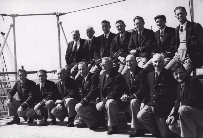 'Aussies' Olympic Team : 'To shoot it-out' Australia's rifle team who arrived at Tilbury to-day, are pictured from left to right.Front row : Mr. J. Holt; Mr. W. J. Harris, Mr. P. A. Pavey; Mr. L. Dove; Mr. J. Cadden; Mr. C. O'Neill, Mr. E. Dean; Mr. M. Menghini; Back row : Mr. J. L. Wise; Mr. H. M. Natt; Mr. R. B. Gratte; Mr. V. R. Butterworth; Mr. N. Goff; Mr. R. Parker; and Mr. C. A. Platt.Part of Australia's Olympic Games team, arrived at Tilbury on board the R.M.S. 'Orion' to-day (Wednesday). The party included the water polo team, and two yachtsmen who have brought their own yachts with them to compete in the Games. Members of the Australian rifle team who are to compete at Bisley and in two Olympic Games events also arrived on the 'Orion'. June 09, 1948.