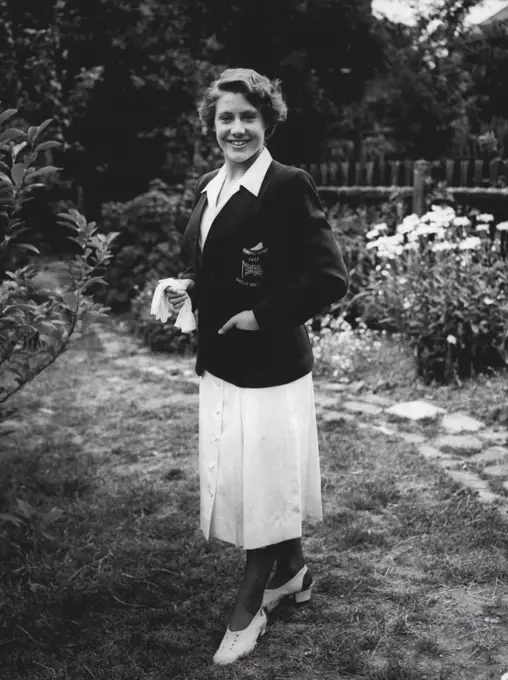 The Olympic uniform: Let the babies of the British Olympic Team, diver ***** of Liford, Essex, pictured this evening in ***** Olympic uniform which will be worn by all woman members at the Games in Helsinki. Tomorrow evening the team is being received by the Queen at Buckingham Palace. July 06, 1952.