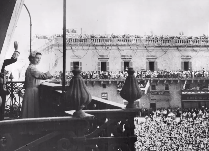 The Queen In Malta -- Her Majesty acknowledging the tumultuous cheers of the assembled crowds from the Palace balcony during her first day in Malta yesterday. January 4, 1954. 