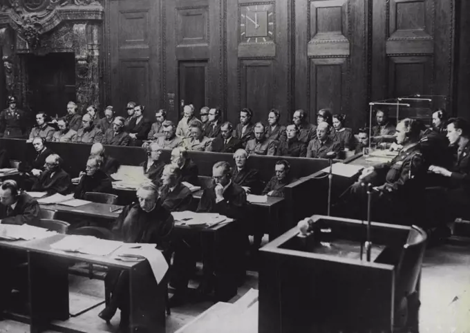 Accused German Doctors and Scientists -- A general view of the court at Nuremberg, showing defendants in dock.Twenty three German Doctors and Scientists are now standing trial in the famous dock at Nuremberg for to turning and murdering concentration camp inmates by means of inhuman experiments. Ghastly stories are being told in court of the murders and atrocities they are alleged to have committed. Some of them are famous throughout Europe for their medical or scientific accomplishments. All have pleaded "Not Guilty". February 1, 1947.