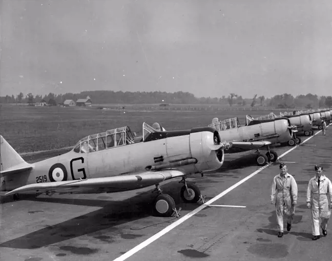 Royal Canadian Air Force -- Harvard trainers at Uplands Airport, Ottawa, stand by for the daily training of Empire air fighters. December 15, 1941.