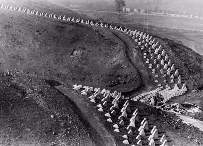 First Pictures Of Germany's Siegfried Line -- Over hill and down dale stretch these lines of reinforced concrete tank barriers - described as the gravestones of tanks.These are the first pictures of Germany's new Siegfried line fortifications along that Western frontiers, described as "The most modern ad astounding works of our time". October 25, 1938. (Photo by Keystone).