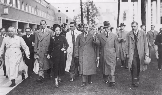 Duke And Duchess Of Windsor Visit Olympic Stadium.  O.P.S. The Duke and Duchess Of Windsor Leaving the house, ***** , at the Reich's Sports field Berlin, Accompated by Dr. Ley (left).  October 13, 1937. (Photo by Keystone)