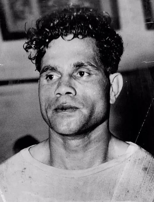 The fighting face of Australian lightweight champion Jack Hassen, who will meet Mexican "Baby" Ortiz at Sydney stadium tonight. May 15, 1950.