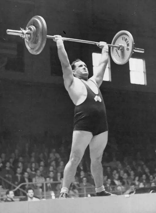 Heavyweight weight lifting at Earls Court.R. S. Magee (Australia) lifting 253 ½ lbs. August 11, 1948. (Photo by Olympic Photo Association Photograph)