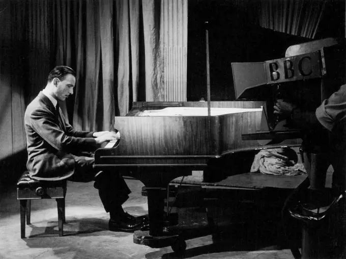 Michelangeli, celebrated Italian pianist, giving a recital before the television camera. September 10, 1947. (Photo by BBC Television Service).