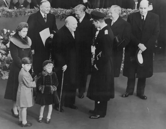 Waiting For The Royal TrainThis pictures was taken at Waterloo station today before the arrival of the Queen mother's train. The Queen brings something of interest to the notice of her children, Prince Charles smooths his glove and Princess Anne's hands are demurely folded in her velvet muff.Sir Winston Churchill talks to the Duke of Edinburgh and between then is Sir Anthony Eden. November 24, 1954. (Photo by London Express News And Feature Services).