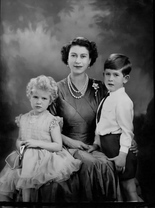H.M. The Queen With H.R.H. Prince Charles And H.R.H. Princess Anne.A new and charming study of her majesty, with T.R.H.'s Prince Charles and Princess Anne. December 26, 1954. (Photo by Marcus Adams, The London Electrotype Agency Ltd.).