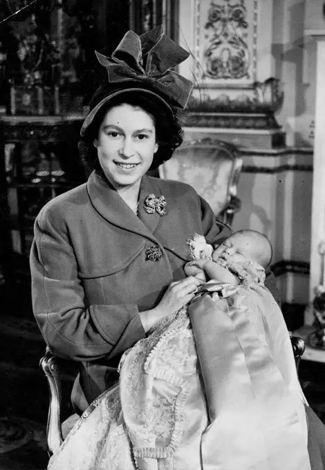 Baby Prince Christened At Buckingham Palace :A happy picture of Princess Elizabeth and her infant son Prince Charles taken in Buckingham Palace after the Christening ceremony today.Prince Charles, as Princess Elizabeth's son will be known to the nation, was christened Charles Philip Arthur George in a ceremony at Buckingham Palace, London this afternoon (Wednesday) when Dr. Fisher, Archbishop of Canterbury officiated Prince Charles's sponsors were: The King, Queen Mary, Princess Margaret, King Haakon of Norway, Prince George of Greece, the Dowager Marchioness of Milford Haven, Lady Brabourne and the Hon. David Bowes-Lyon. December 15, 1948. (Photo by Reuterphoto).