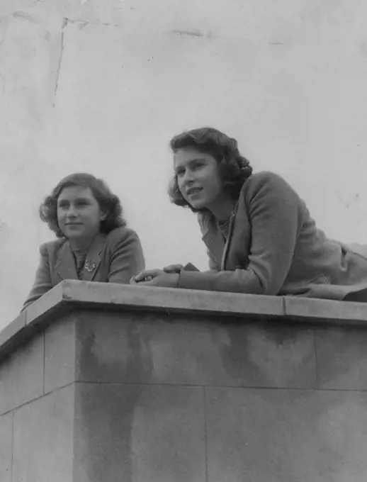 Princess Elizabeth with her younger sister Princess Margaret. June 13, 1944. (Photo by Studio Lisa).