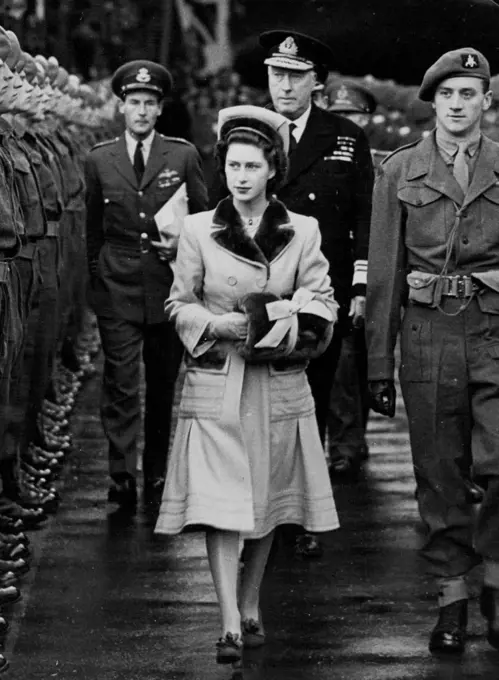 Princess Margaret and Mr. Peter Townsend.Princess Margaret and Mr. Peter Townsend photographed at launching of the "Edinburgh Castle" in Belfast in 1947. Equerry to the King, he was constantly at the young Princess' side an official engagements.The above picture catch Townsend off grand as he shows his interest in Princess Margaret at two ***** when he was a member of the *****. September 03, 1955. (Photo by Topical Press).