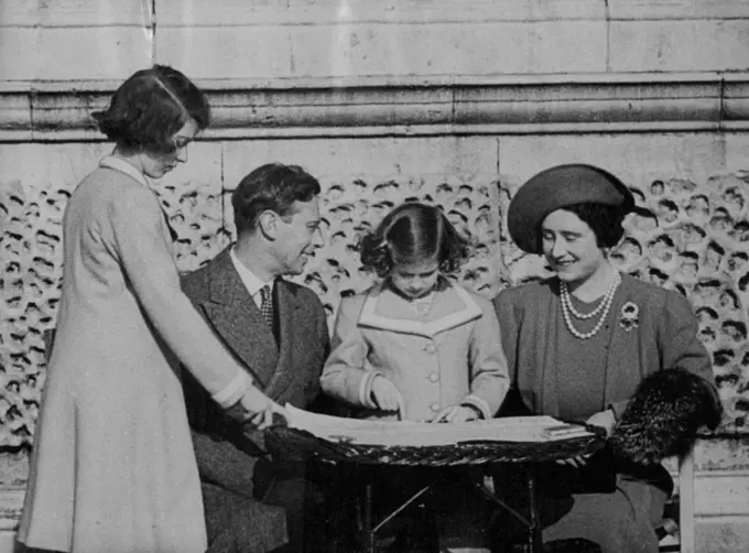 King and Queen Show Princess their Route for North American Tour - The King and Queen showing their route to Princess Elizabeth (standing) and Princess Margaret in the grounds of the Palace.Seated in the sunshine in the grounds of Buckingham Palace, with a large map spread before them, the King and Queen pointed out to Princess Elizabeth and Princess Margaret their route during the visit to Canada and America next month. April 25, 1939.