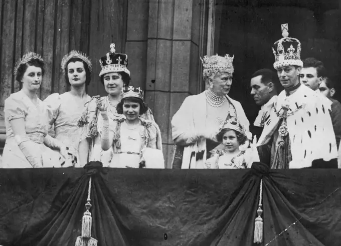 The coronation of King George VI. And Queen Elizabeth. Scenes After The Ceremony .A happy picture on the balcony of balcony of Buckingham Palace, showing H.M. The King N.M. The Queen, Queen Mary, and the two princesses.Queen Marry's family after the Coronation of George VI and Queen Elizabeth. Waving is the young Princess now Queen Elizabeth II. From this balcony of Buckingham Palace, the old Queen has seen events shape themselves and then pass into history - while she lives on. May 12, 1957. (Photo by Sport & General Press Association Limited).