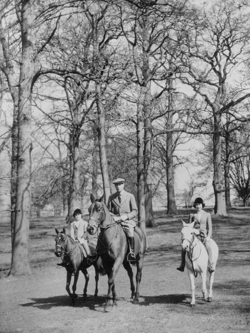 Princess Elizabeth Rides With Her Father At Windsor On Thirteenth Birthday -- Princess Elizabeth (right) riding with her father, King George, and Princess Margaret in Windsor Great Park on her thirteenth birthday.Princess Elizabeth went riding with her father, King George, and her sister, Princess Margaret, in Windsor Great Park on her thirteenth birthday. The Royal family is staying at Windsor Castle. April 21, 1939.