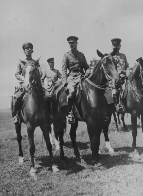 British Prince Reviews Jap Cavalry -- The Duke of Gloucester son of King George of England is shown in center 17ith Prince Chichibu (left) and Japanese Army officers during the Review of the Japanese cavalry troy at Narashino, near Tokio, during the duke's mission in Japan to bestow the most noble order of the garter upon the Japanese emperor. May 21, 1929. (Photo by Associated Press Photo).