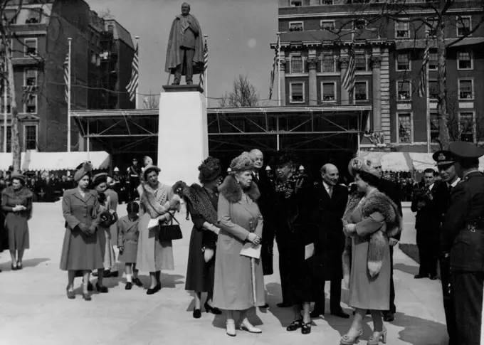 British Homage To Roosevelt -- The Royal family with Mrs. Roosevelt immediately after the unveiling. (Left to Right) Commencing with first group on Left: Princess Elizabeth; Princess Margaret; Princess Michael of Kent with his mother the Duchess of Kent. At Right centre Queen Mary chats with Mrs. Roosevelt and Queen Elizabeth, King George ***** seen at right (Facing Camera) chatting with field Marshal Viscount Alexander, Governor General Of Canada. President Truman's personal representative, Henry S. Hooker stands between Queen Mary and Mrs. Roosevelt, background; and Prime Minister Clement Attlee is at background between Mrs. Roosevelt and Queen Elizabeth. Lady on Queen Mary's right background unidentified. The British Memorial to the late U.S. President Franklin D. Roosevelt, was unveiled by the widow, Mrs. Franklin Roosevelt at Grosvenor Square, April 12. The Statue, in green bronze, is the work of Sir William Reid Dick. April 27, 1948.