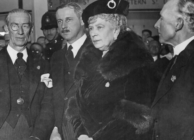 Her Majesty The Queen, Visits The Textile Section Of The British Industries Fair, At White City, London. W. -- H.M. The Queen at the exhibition. February 21, 1934. (Photo by Sport & General Press Agency Limited).