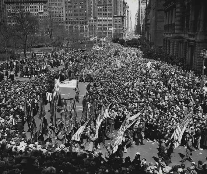 Jewish Veterans Parade - Jewish war veterans parade at Madison Square Park, New York city, Apr. 4, past part of a crowd of more than 100,000 persons, in protest to the United States stand on Palestine. Among the more than 26,000 veterans who marched in the parade were contingents from the five boroughs of New York, various sections of New York state, Connecticut, Massachusetts, Rhode Island, Ohio, Virginia, Delaware, New Hampshire, Maine, Vermont, New Jersey, Pennsylvania, Maryland and the district of Columbia. Scene looks North from Madison Ave. April 4, 1948. (Photo by Associated Press Photo).