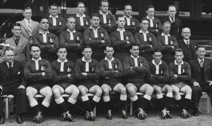 Queensland Team 1950Back row: D. Green (visitor), N. Andrews, I. Jones, H. Crocker, J. Wedesweiler, N. Linde, C. Furness (trainer).Centre: F. Russell (visitor), D. Hall, A. Thompson, J. Munn, D. Flannery, W. Sullivan, D.  McGovern, V. Jensen (president QRL).Front row: F. Gilbert manager, R. Griffiths, B. Davies, C. Quinn, W. Thompson, J. Rooney, V. Irwin, H. Griffiths, C. R. Walsh manager. May 22, 1950.