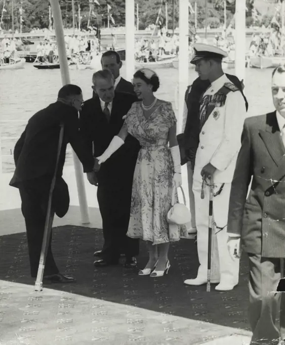 ***** the Queen steps on to the pontoon at Farm Cove and is introduced by Premier Cahill to the Hon. A.G. Enticknap, Minister for Conservation. February 3, 1954.