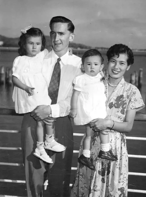 Gordon Parker of Melbourne, a former corporal with BCOF, with his pretty wife Cherry and their two children Margaret and Kathleen. In January Mrs. Parker had a son.Japanese War Bride in Cairns***** liner Taiping to-night.With him was his Japanese wife-the first permitted in to Australia by the Commonwealth Government-and their two children. Margaret will be three years of age next month, and Kathleen is aged 12 months.Mr. Parker, who was discharged from the army in January, 1949, said to-night he was not in the least worried about returning to Australia.The only emotion he felt was gladness at being home again. July 08, 1952.