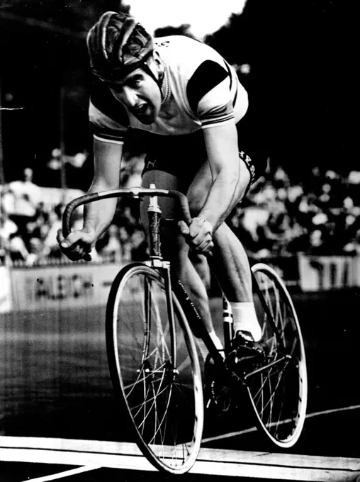 This man means business. He is Sid Patterson, Australian cyclist, in action at Herne Hill yesterday. He set up two British Professional records - mile and half-mile unpaced flying start.The Notable Smile is missing when he's breaking records. May 19, 1952.