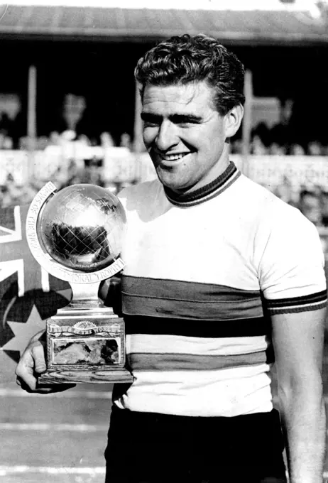 Cycling, The Champion of Champions:Sid Patterson, Australian World Amateur Sprint Champion, with his Trophy after winning the Champion of Champions race at Herne Hill track, London. April 7, 1950. (Photo by Sport & General Press Agency, Limited).
