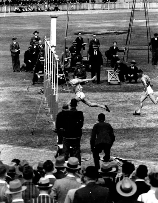A. Patton (new Rugby League Winger) winning the 6th heat of the Stawell Craft (Professional) football. April 5, 1937.