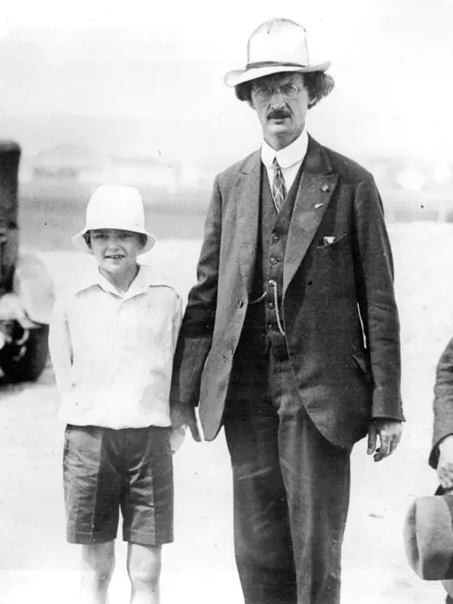 Professor Piccard Ready -- Professor Piccard with his son the airfield at Zurich.Professor Piccard is at Zurich, Switzerland and plans to make his new ascent into the stratosphere today August 10. He goes with a companion to collect more scientific data. September 26, 1932. (Photo by Associated Press Photo).