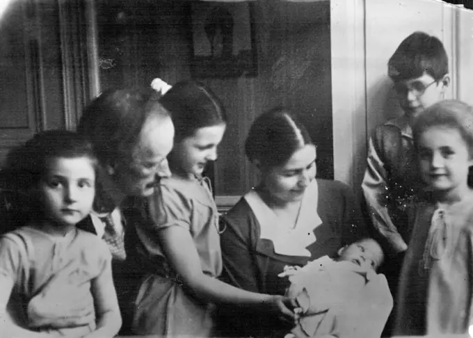 Professor Piccard who made World-famous ascent by balloon in to the stratosphere has since had a fifth child born into his family. Piccard and his family shown here. February 01, 1932.