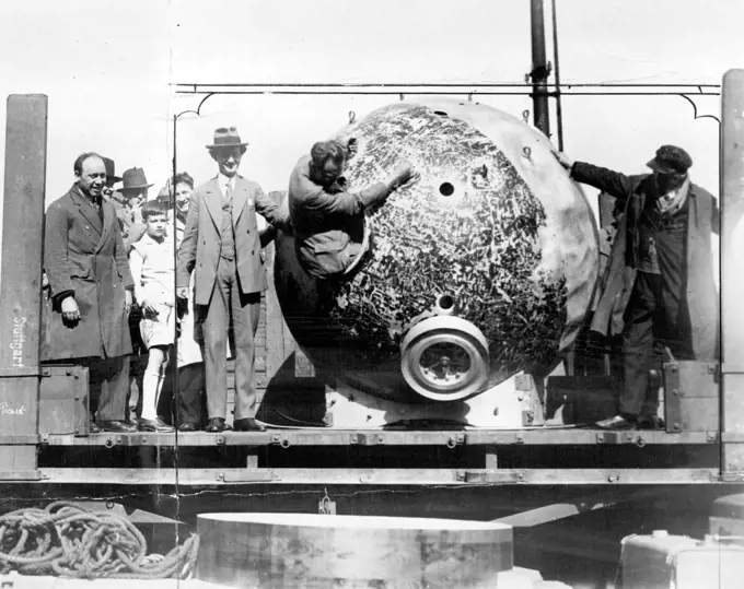 Prof. Piccard's Gondola, Arrives In Brussels -- Prof. Piccard with his gondola on arrival in Brussels. Prof. Piccard's gondola, in which he landed in the alps after flying 10 miles high; arrived in Brussels today, to be placed in the Brussels University. May 21, 1932. (Photo by Keystone).