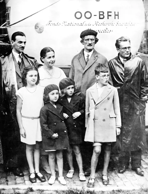 Professor Piccard, with Max Cozyns, M. Kipfer, his wife and family, grouped near the great aluminium sphere before the scientists ascended to the stratosphere to study cosmic rays. September 01, 1932.