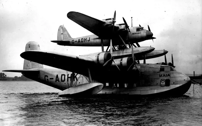 "Pick-A Back" Plane Ready -  The Mayo-Composite aircraft joined together for the first time seen on the Medway, at Rochester.The Mayo-Composite Aircraft, is now complete on the Medway at Rochester.The two planes, the four-engined sea-plane "Mercury" and its parent plane the 3,350H.P. Flying-Boat "Maia", are now in their positions, one fixed on top of the other, for the first time. This "pick-a-back" plane, brings India and New York within a day's non-stop flight, has a range of 3,500-4,000 miles without landing, and is the first aerial tug the world had known. October 12, 1937. (Photo by Sport & General Press Agency Limited).