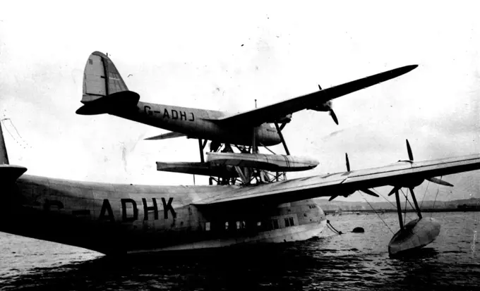 First Pictures of Mayo Composite Flying Boat -- The Mayo Composite on the Medway of Rochester today.The first tests of the Mayo composite plane a large flying seat, the "Maia", and a small seaplane, the "Mercury", ***** place today at *****. October 12, 1937. (Photo by Keystone).
