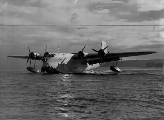 Qantas Empire Airway Flying Boat, "Cooee", taxis to the morning at Rose Bay. April 26, 1939. (Photo by Russell Roberts Pty. Ltd.).