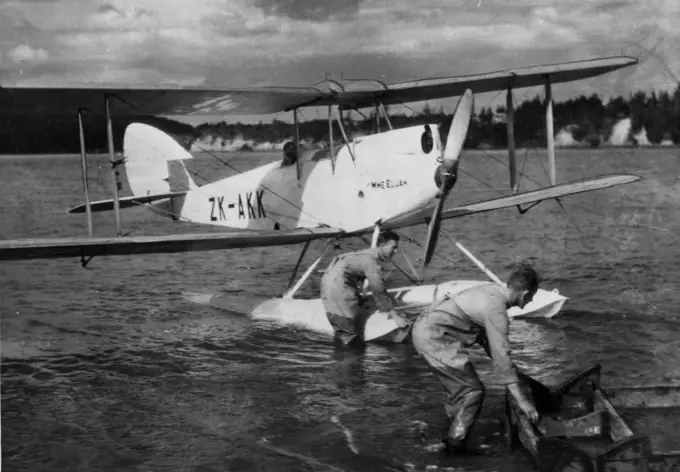 Intrepid Airman Sets Out On A Flight From N.Z To Australia.Chichester's plane being launched at the Hobsonville air base early on Saturday morning last. April 22, 1931. (Photo by The Auckland Daily News).